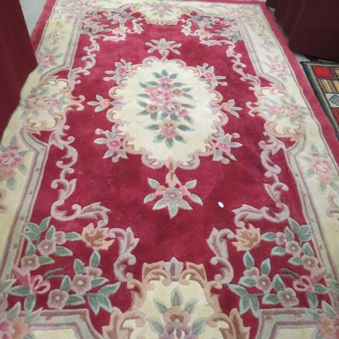 Appraisal: Chinese Handmade Sculptured Rug floral on red field ' x