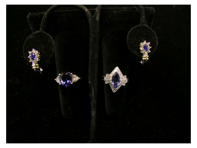 Appraisal: Two rings and one pair of earrings including K white