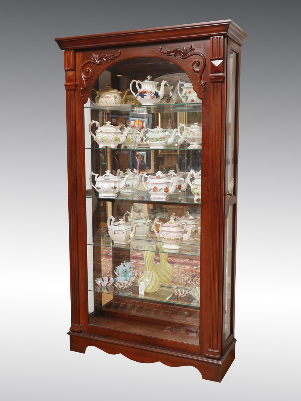 Appraisal: GLASS FRONT DISPLAY SHOWCASE Display case having a single light