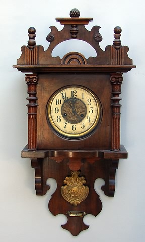 Appraisal: German- day time and strike with exposed pendulum walnut Art