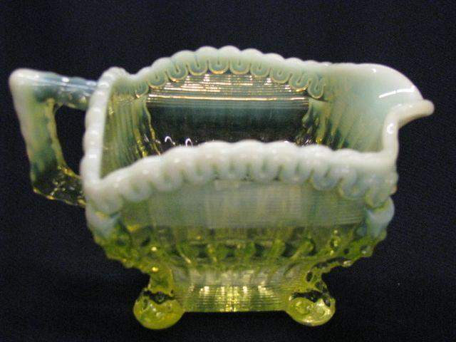 Appraisal: Vaseline Opalescent Art Glass Creamer Victorian footed