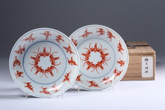 Appraisal: PAIR CHINESE IRON RED AND WHITE PORCELAIN BAT DISHES Guangxu