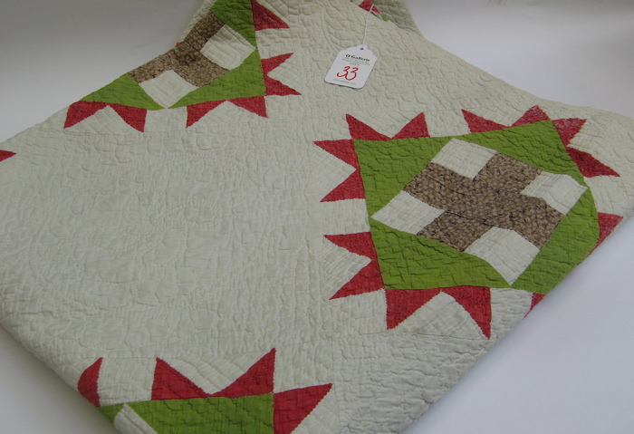 Appraisal: AN AMERICAN PIECED HANDMADE COTTON QUILT in the Devil's Claw