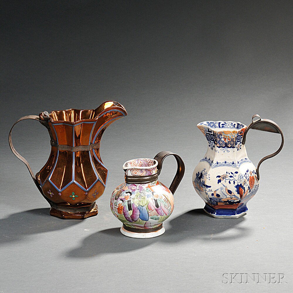 Appraisal: Three Make-do Ceramic Pitchers England th century a paneled copper