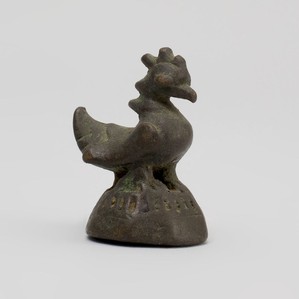 Appraisal: Indian Bronze Figure of a Bird Raised on a lucite