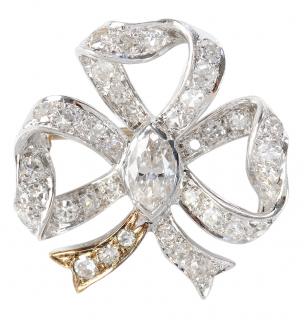 Appraisal: kt Diamond Bow Brooch one center marquise cut diamond estimated