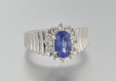 Appraisal: A Platinum Diamond and Sapphire Ring Platinum mounting with reeded