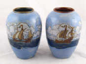 Appraisal: A pair of Royal Doulton vases by Emily Beard decorated