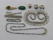 Appraisal: A mixed lot of silver and silver coloured jewellery including