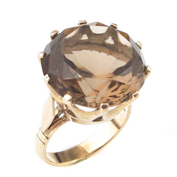 Appraisal: A smokey quartz and k gold ring