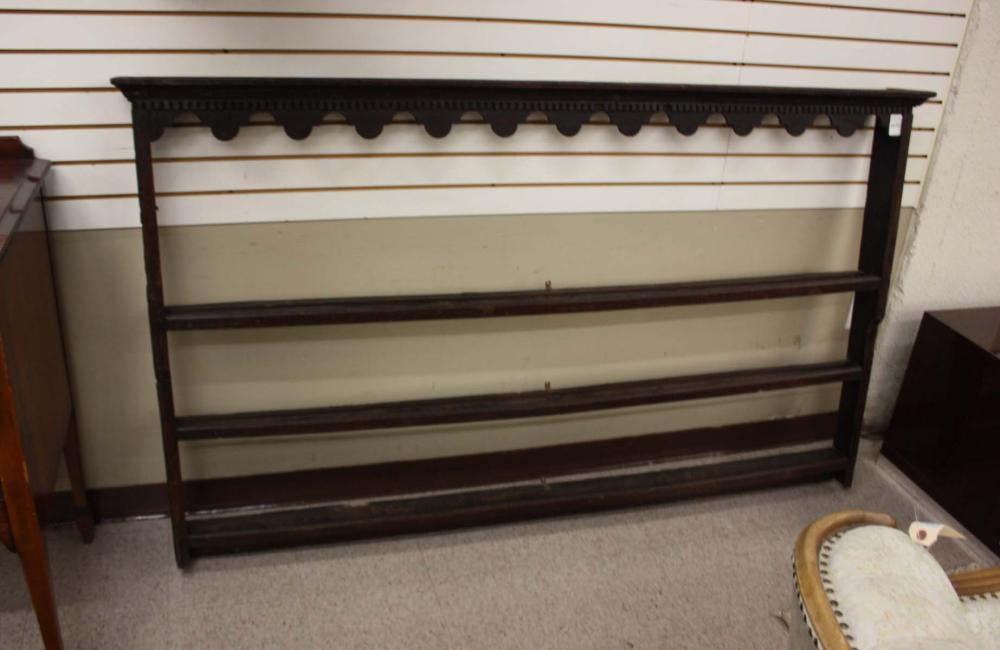 Appraisal: GEORGIAN OAK WALL-MOUNT PLATE RACK English th century having three