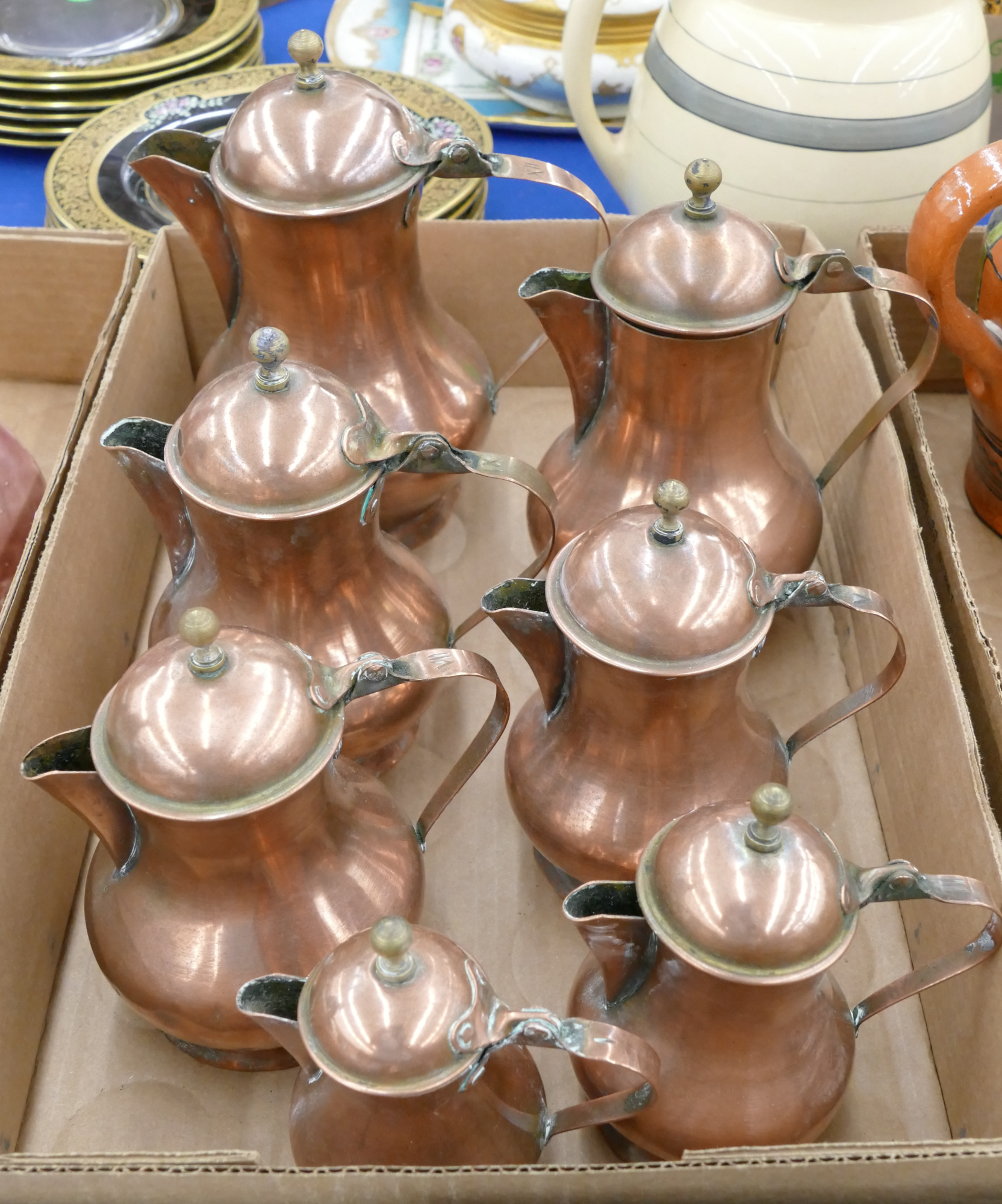 Appraisal: Box Old Graduated Copper Teapots