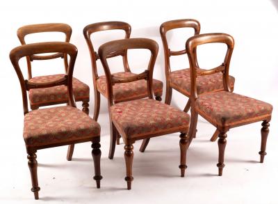 Appraisal: A set of six Victorian mahogany balloon back dining chairs