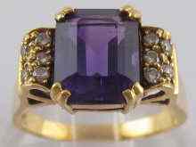 Appraisal: A yellow metal tests carat gold amethyst and diamond ring