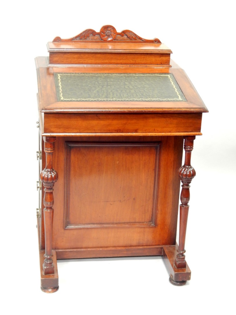 Appraisal: An Edwardian mahogany Davenport with fitted pen box to the