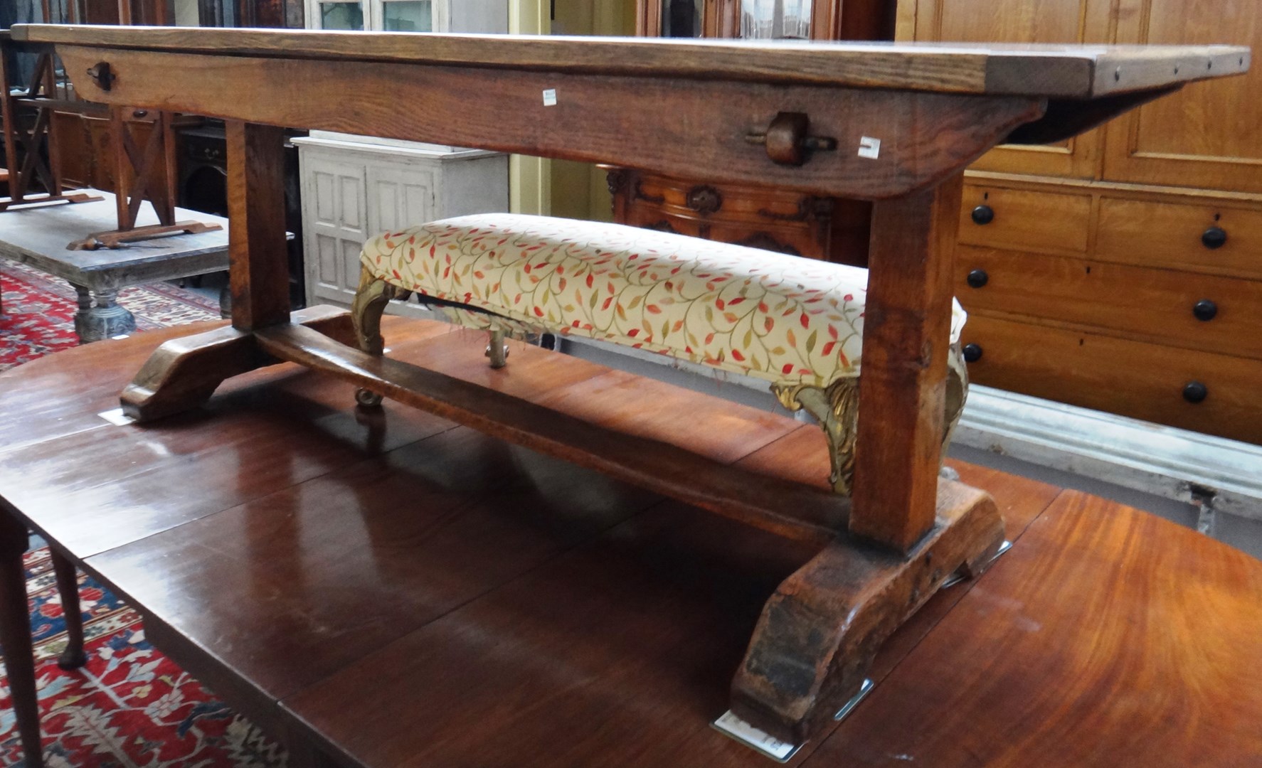 Appraisal: A th century style oak refectory table on trestle end