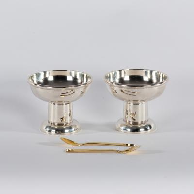 Appraisal: A pair of silver pedestal salts R N F London