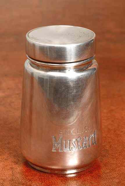 Appraisal: A SILVER 'ENGLISH MUSTARD' POT AND LID with blue glass