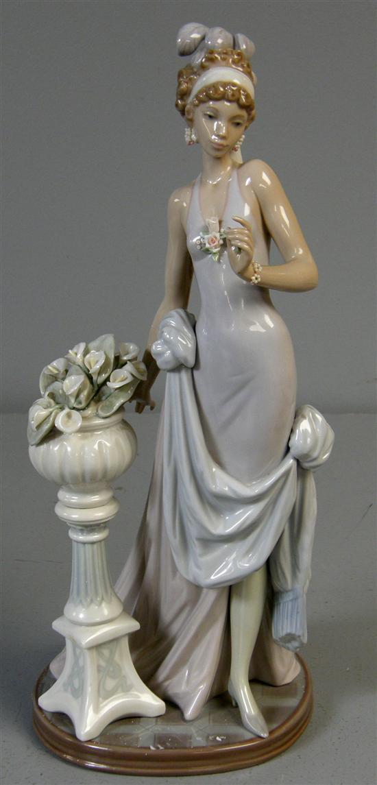 Appraisal: Lladro figure of a lady standing by a jardiniere h