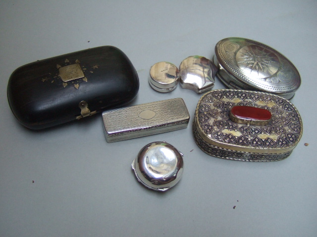 Appraisal: A silver circular pill box with embossed decoration Birmingham two