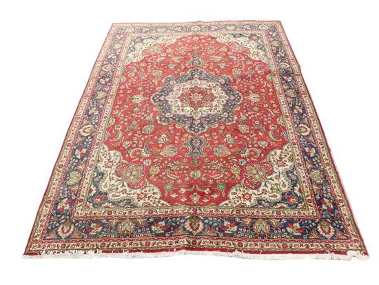 Appraisal: RUG Semi-antique Persian Tabriz carpet cherry red field floral and