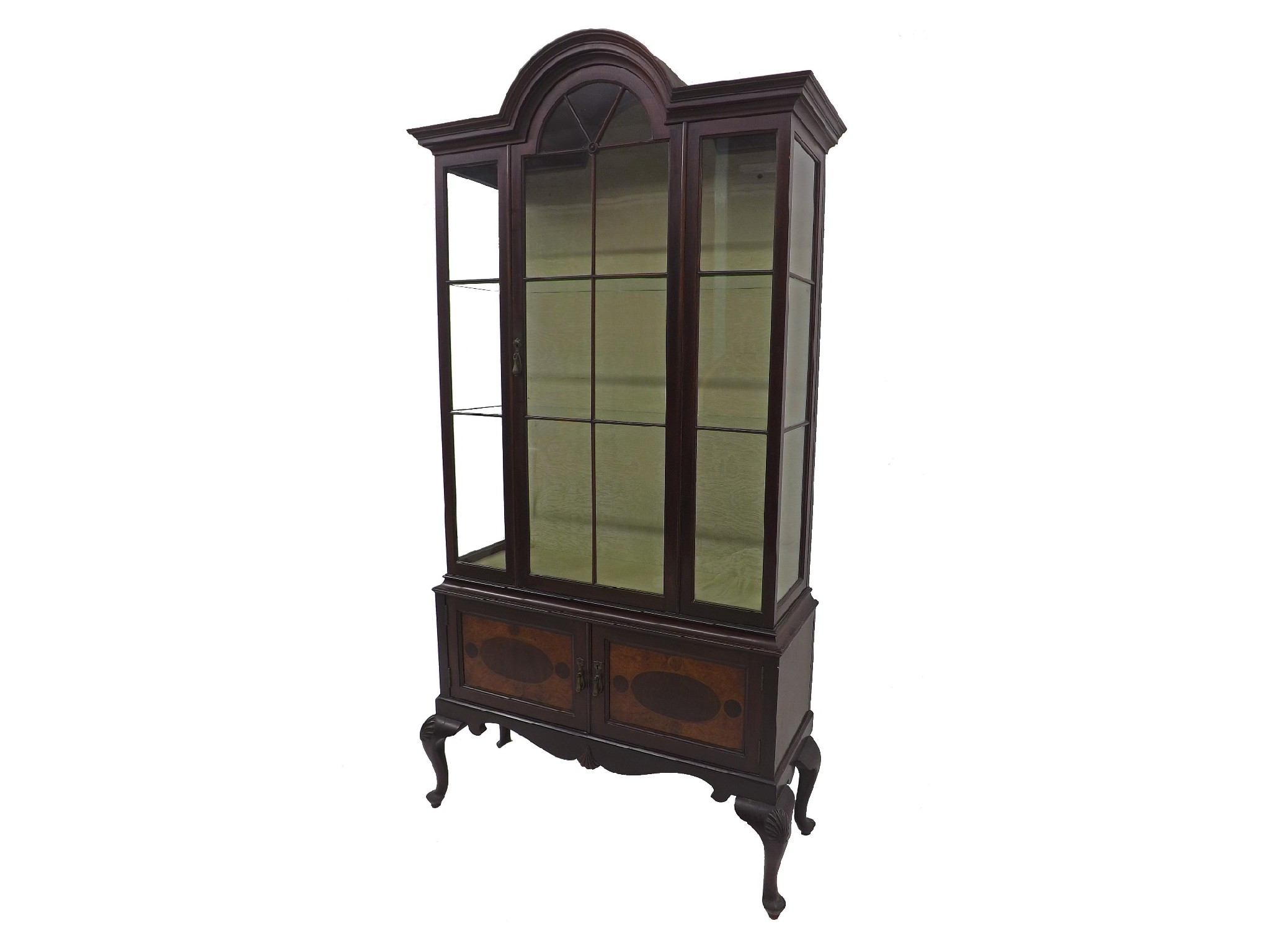 Appraisal: s mahogany glazed display cabinet the arched panelled door enclosing