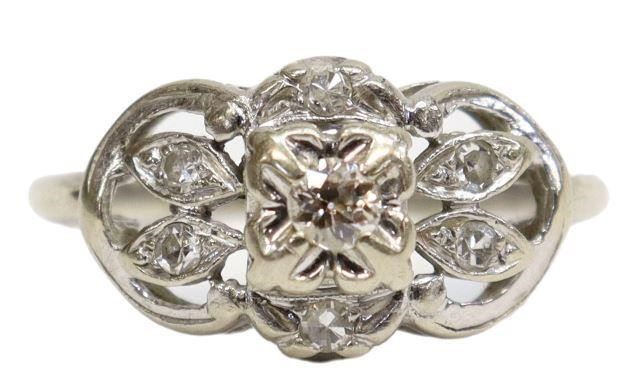 Appraisal: Estate kt white gold and diamond ring open work foliate