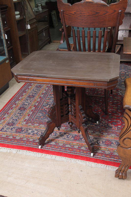 Appraisal: SLATE TOP VICTORIAN TABLE Eastlake style table having a brown