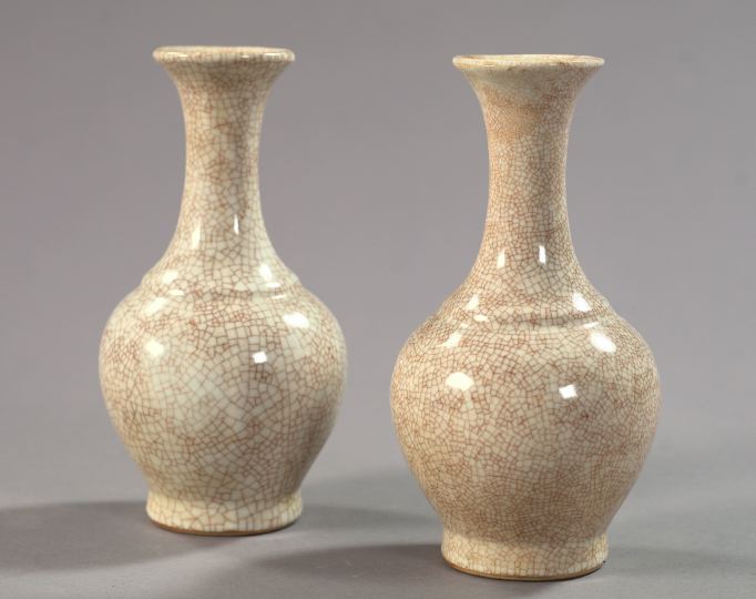 Appraisal: Pair of Tao Kuang Ecru Crackle-Glazed Porcelain Long-Neck Vases second