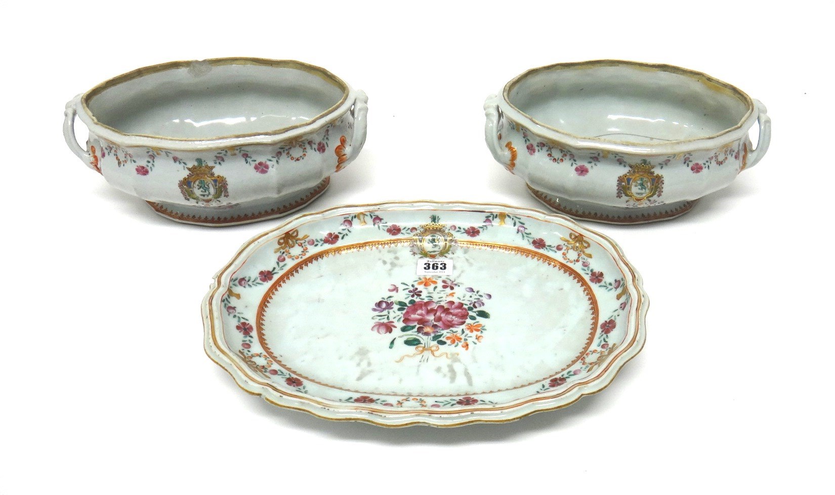 Appraisal: A pair of Chinese armorial famille-rose two-handled tureens and one