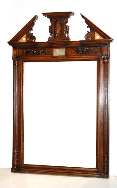 Appraisal: A Neoclassical style marble inset walnut mirror height in width