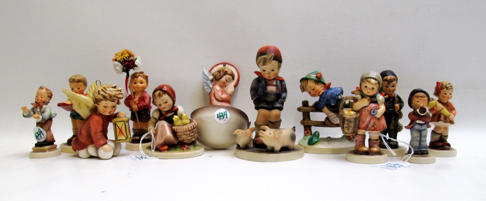 Appraisal: TWELVE HUMMEL PORCELAINS trademarked from to Present TM- to TM-