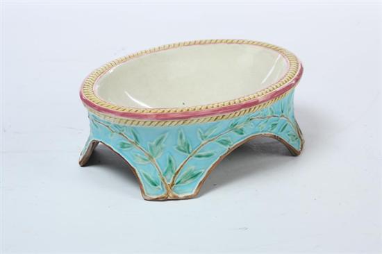 Appraisal: MAJOLICA DOG DISH English nd half- th century Turquoise dish