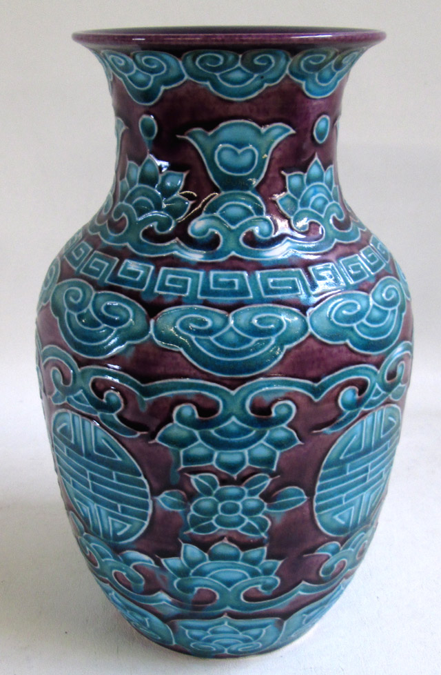 Appraisal: CHINESE CERAMIC VASE Early th century having raised turquoise motif