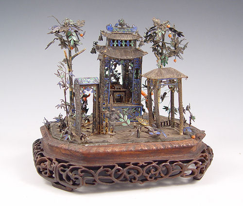 Appraisal: MINIATURE CHINESE ENAMELED SILVER ALTAR IN LANDSCAPE Complete with fruit