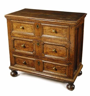 Appraisal: A late th century oak chest the moulded edge top