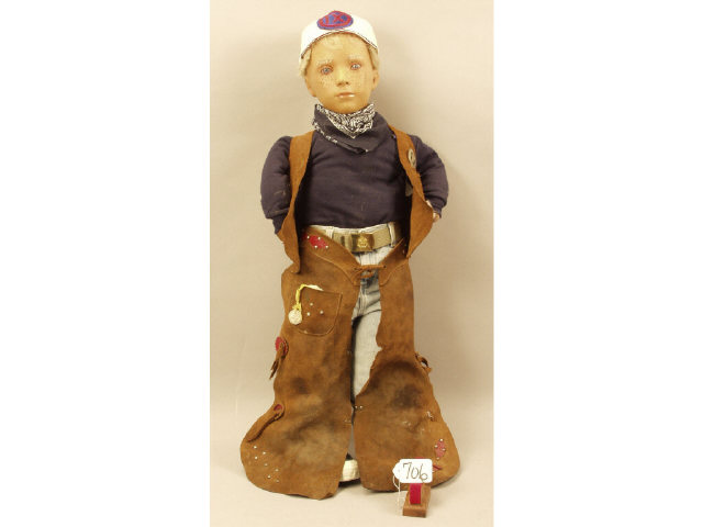 Appraisal: Boy mannequin dressed in cowboy chaps and ball cap Estimate