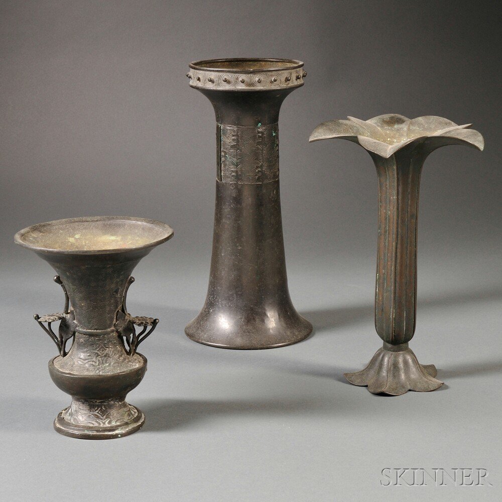 Appraisal: Three Bronze Vessels China an elongated floral-form vase with everted