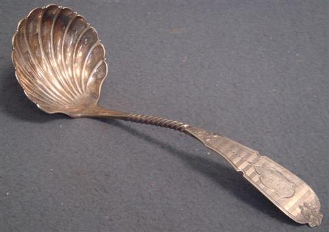 Appraisal: Engraved coin silver ladle by R W Wilson shell bowl