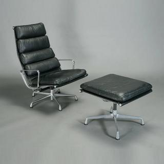 Appraisal: Eames Chair with a Ottoman in Black Leather Eames Chair