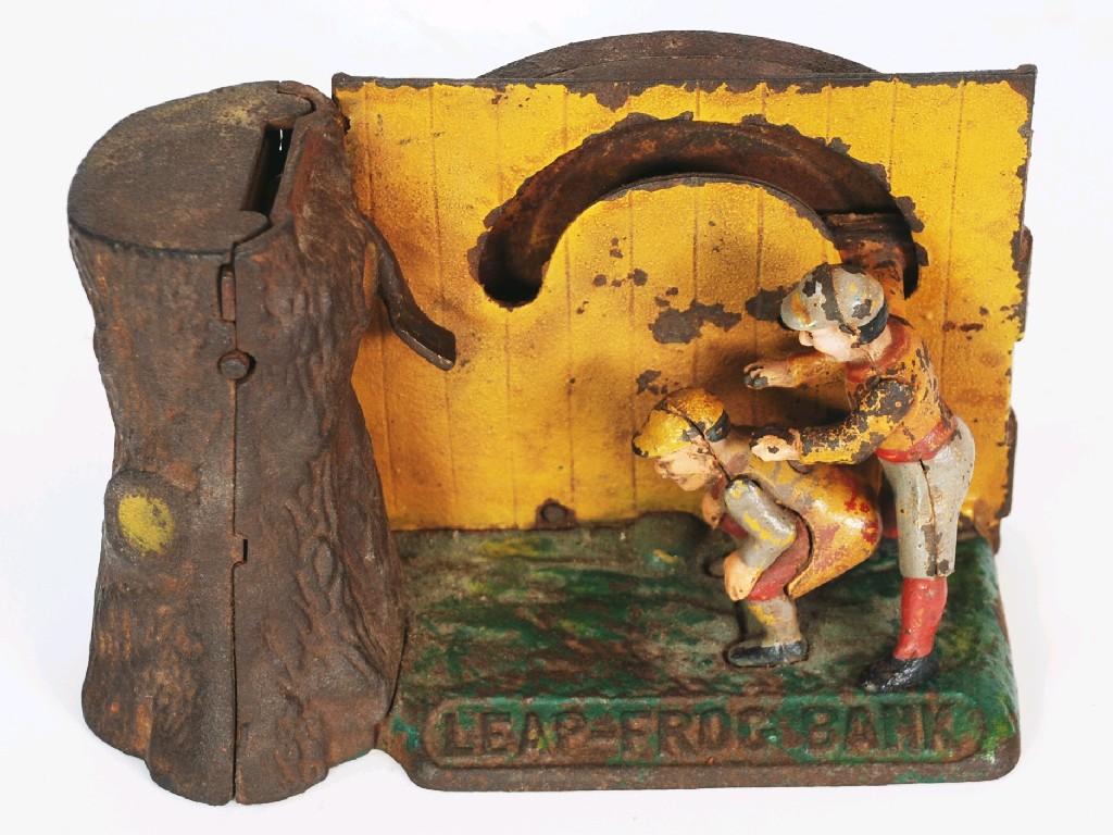 Appraisal: OLD CAST IRON AND PAINTED COPY OF A LEAP-FROG BANK