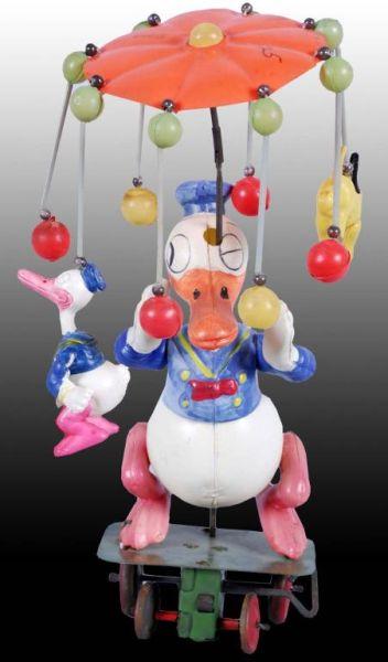 Appraisal: Walt Disney Celluloid Donald Duck Carousel Toy Description Pre-war Japan