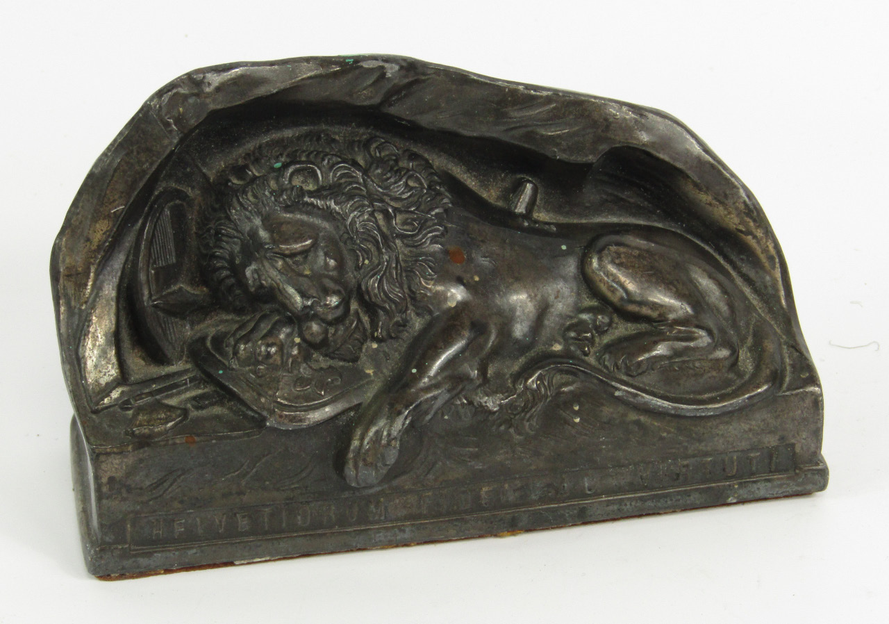 Appraisal: A cast white metal figure of the Lion of Lucerne