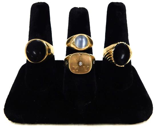 Appraisal: JEWELRY Four - K yellow gold men's rings first K