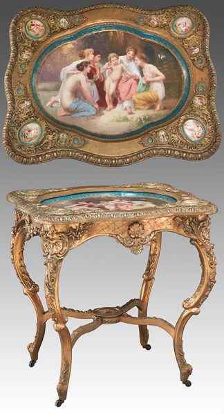 Appraisal: Royal Vienna style porcelain and gilt-wood table the central plaque