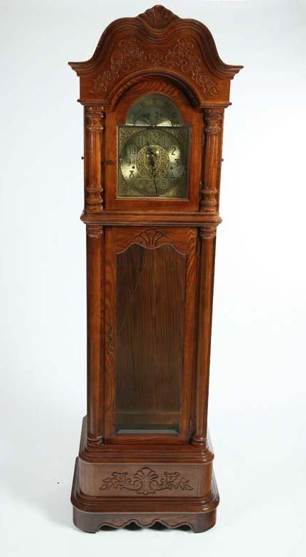 Appraisal: RIDGEWAY TALL CASE CLOCK Brass time and strike movement in