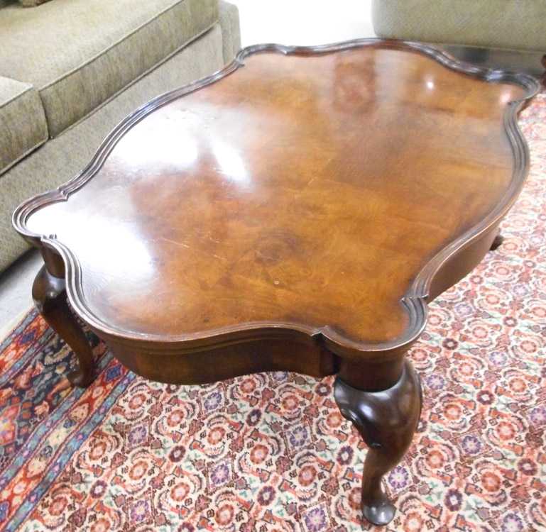 Appraisal: QUEEN ANNE STYLE COCKTAIL TABLE late th century having an