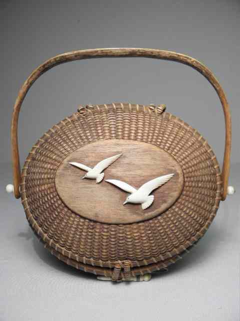 Appraisal: A Nantucket friendship basket or purse by N Z Giffin