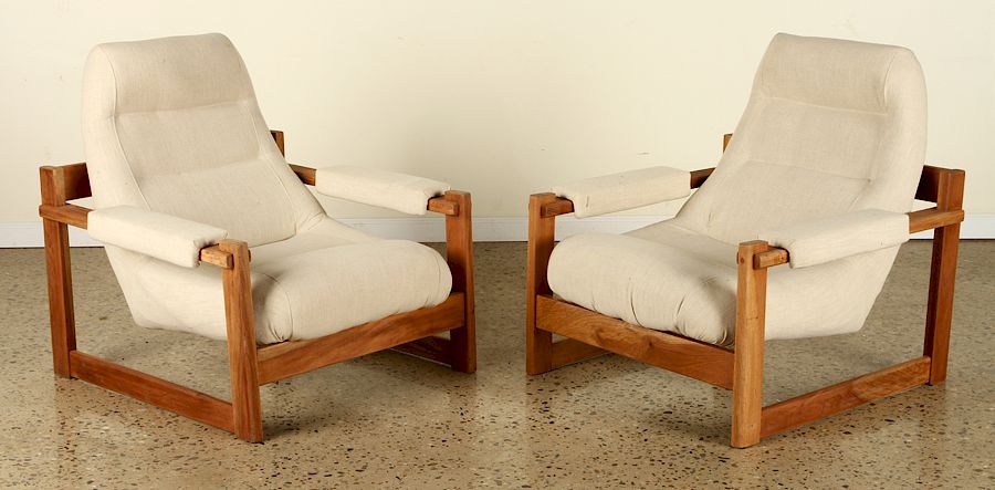 Appraisal: PAIR BRAZILIAN LOUNGE CHAIRS UPHOLSTERED OPEN ARM A pair of