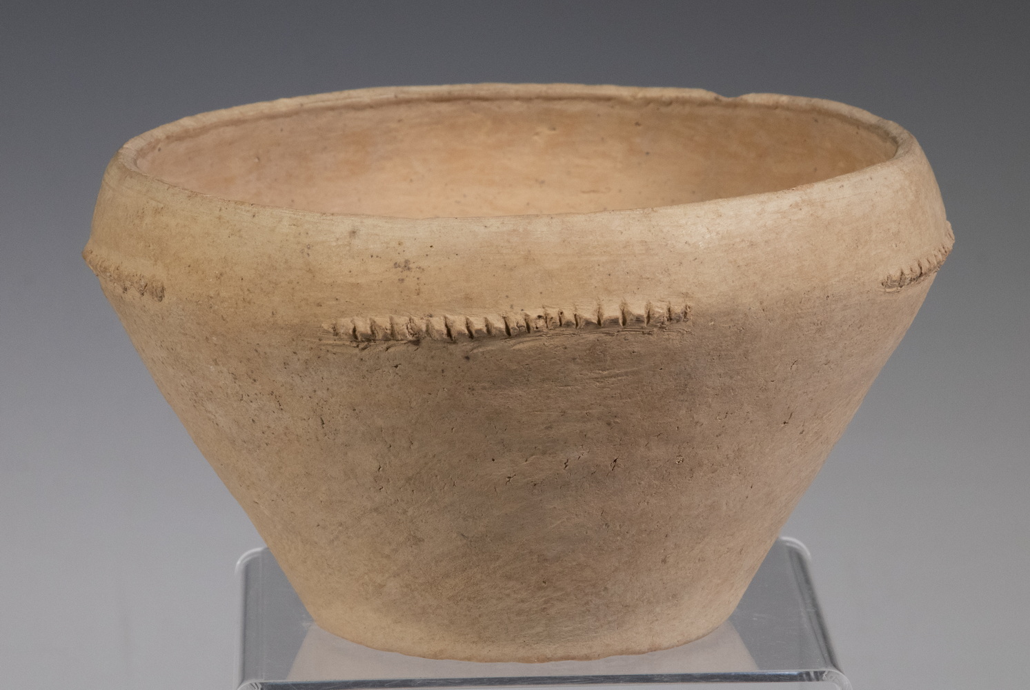 Appraisal: CHINESE NEOLITHIC POTTERY BOWL QIJIQ CULTURE BC BC Terracotta Bowl